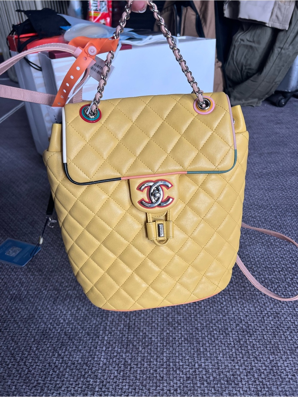 CHANEL Yellow Quilted Leather Backpack with Multicolor Trim and Chain Straps